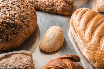 Assortment of tasty bakery products on table