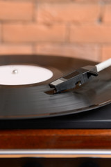 Fototapeta na wymiar Record player with vinyl disc, closeup