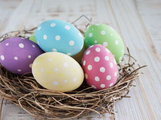 Fototapeta na wymiar Painted colorful Easter eggs background - Easter holiday celebration background concept