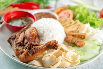 Nasi lemak kukus with fried drumstick