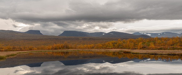River in autumn. Abisko national park in Sweden.