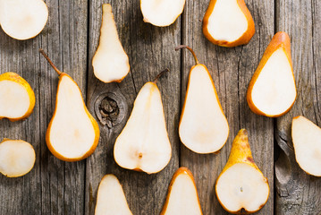 sliced pears on old wood table