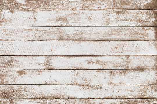Vintage white wood background - Old weathered wooden plank painted in white color.