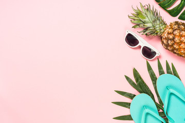 Summer flat lay background on pink.