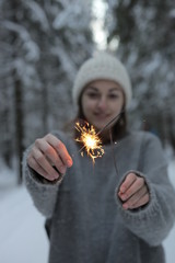 girls with sparklers in hand