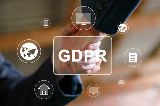 Business partnership handshake concept. Two coworkers handshaking process of interaction general data protection regulation GDPR