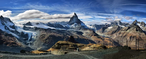 Fotobehang Amazing View of the panorama mountain range near the Matterhorn in the Swiss Alps. Trek near Matterhorn mount. © nikitos77