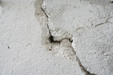 Cracked  white painted wall. Textured background