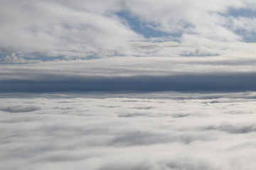 Fototapeta na wymiar between clouds