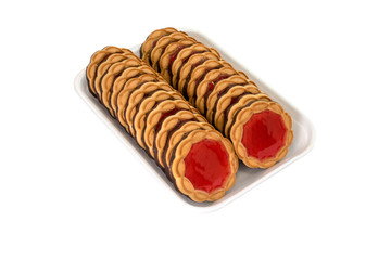 Round biscuits with red jam on a white background.