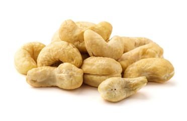 cashew nuts heap on white background