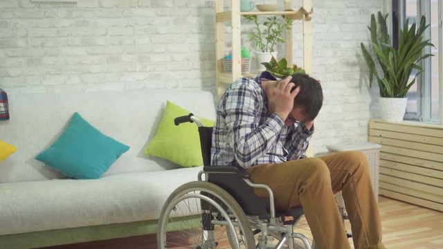 adult male disabled person wheelchair autistic panic fit home