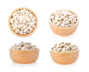 White beans in wood bowl isolated on white background
