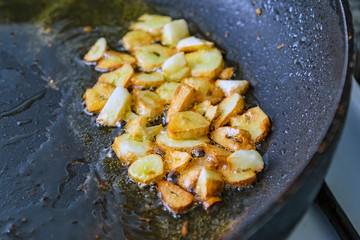 homemade fried garlic in a pan