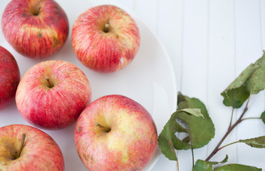 Red organic  apples with leaves