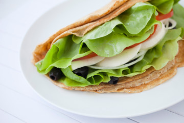 Sandwich with mozzarella and vegetables