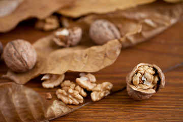 Walnuts on wooden background