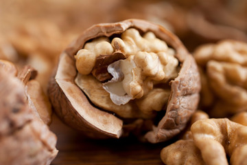 Walnuts on wooden background