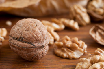 Walnuts on wooden background