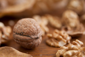Walnuts on wooden background