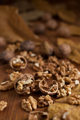 Walnuts on wooden background
