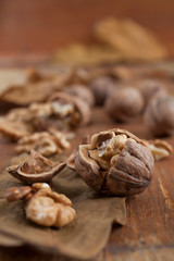 Walnuts on wooden background