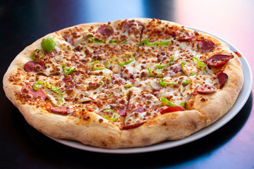 Traditional delicious Italian food; Pizza. Food concept photo.