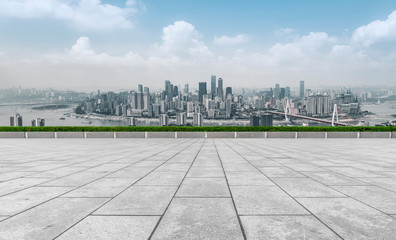 Urban skyscrapers with empty square floor tiles
