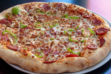 Traditional delicious Italian food; Pizza. Food concept photo.