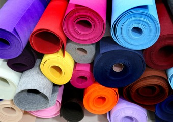 Shelf with a wide selection of colorful fabrics 