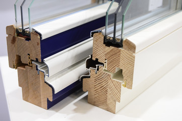 demonstration  elements of a two-chamber plastic and wooden window to the consumer Sample showing...