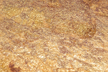 stone texture golden with pink overflowing textureless background
