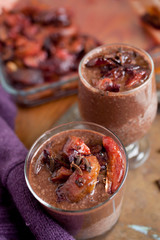 Chocolate smoothie -milkshake with plums and cloves