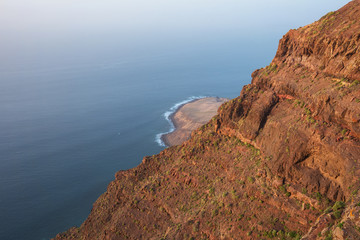 Scenic volcanic coastline landscape, Cliffs in Tamadaba natural park, Grand Canary island, Spain .