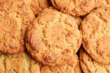Closeup of a group of assorted cookies. Oatmeal chip. Top view. Biscuit background.