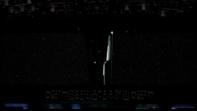 The view from a space shuttle cockpit as it drifts out into the universe.