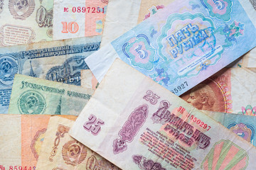 Fototapeta na wymiar A pile of Soviet paper money scattered on the table.