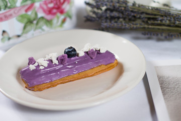 French dessert Eclair on white background