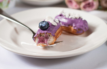 French dessert Eclair on white background