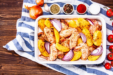 Raw chicken wings prepared for roasting