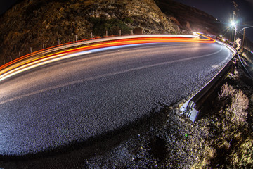 car light trails on serpentine road