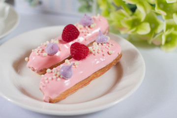 French dessert Eclair on white background