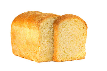 A traditional square loaf of bread is isolated on a white background.   bread isolated on a white background. square loaf of bread with two pieces cut off on a white background. 