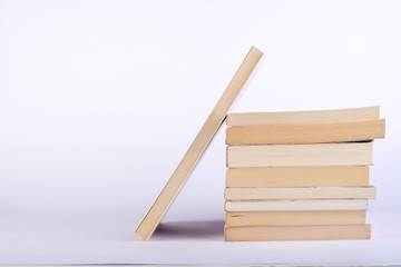 stack of books  on white background