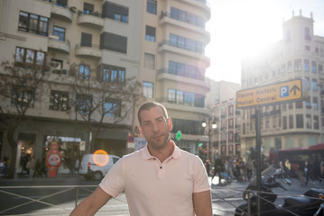 Attractive man posing in the city