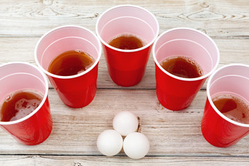 Cups for game Beer Pong on the table