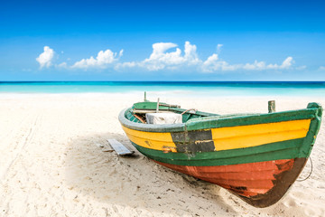 Naklejka na ściany i meble Summer boat on beach and sea landscape 