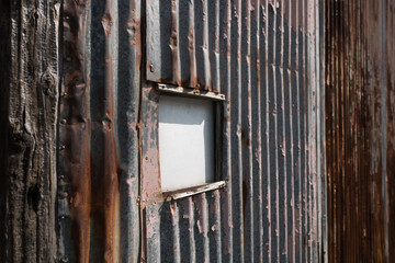 An old corrugated steel wall