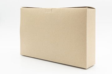 Closed blank cardboard brown box isolated on white background