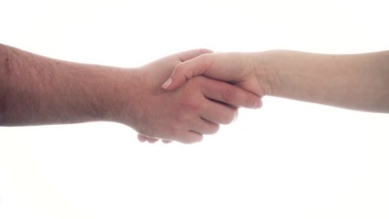Man and woman shaking hands.